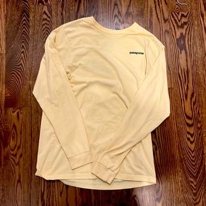 Yellow long sleeve patagonia t-shirt.